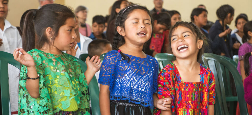 Guatemalan girls worshiping God