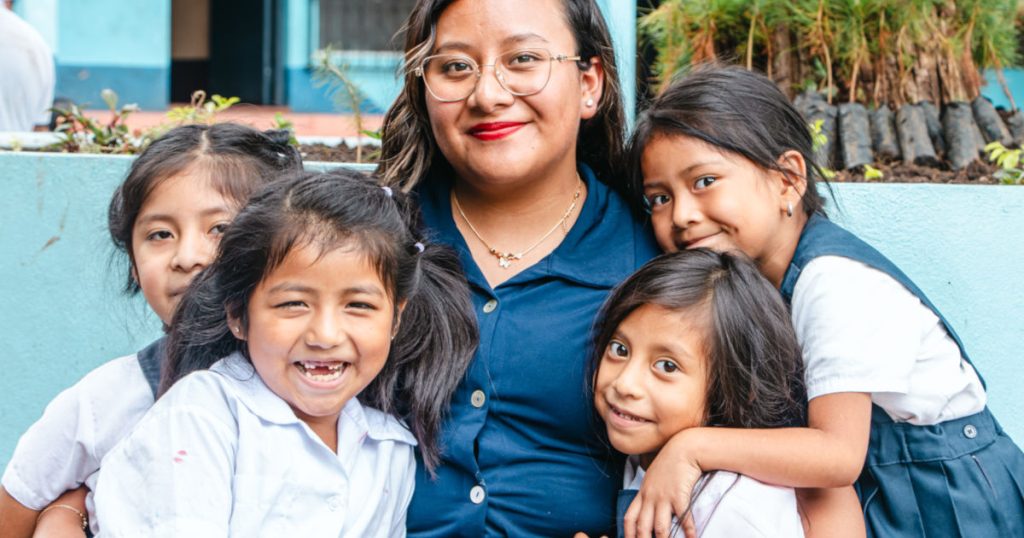 vida students with their teacher
